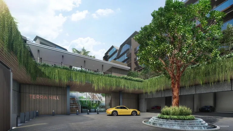 The Arrival Plaza at Terra Hill: a feature tree on a tiered fountain at the drop-off, with cascading greenery over the TERRA HILL entrance wall (artist's impression)